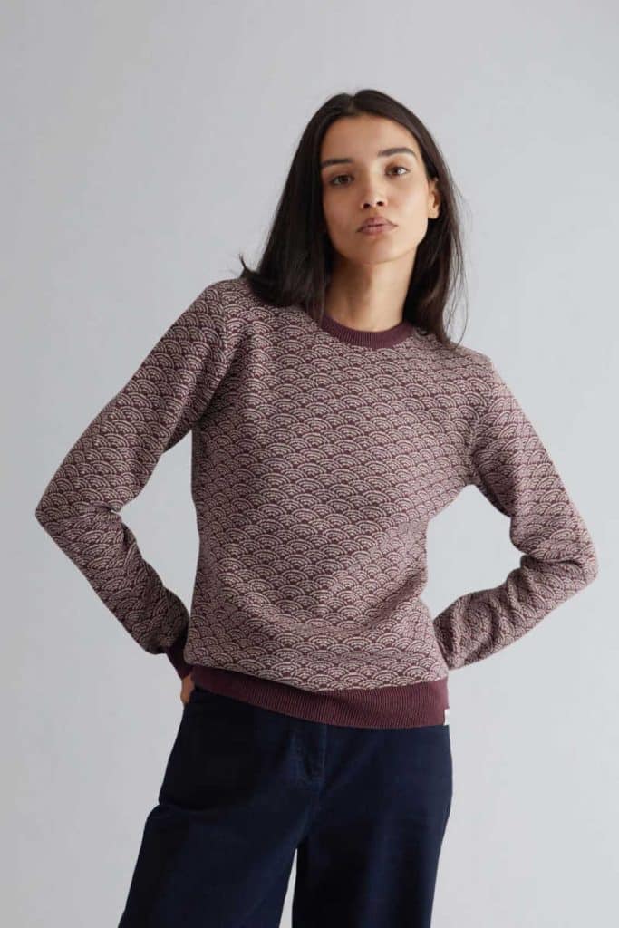 Person wearing an organic cotton and vegan jumper from Komodo