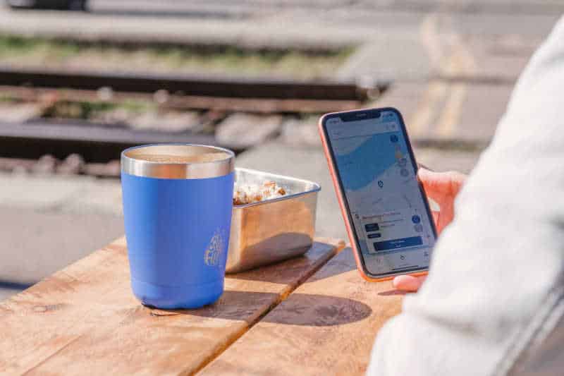 Person having a plastic-free lunch whilst using the Refill app.