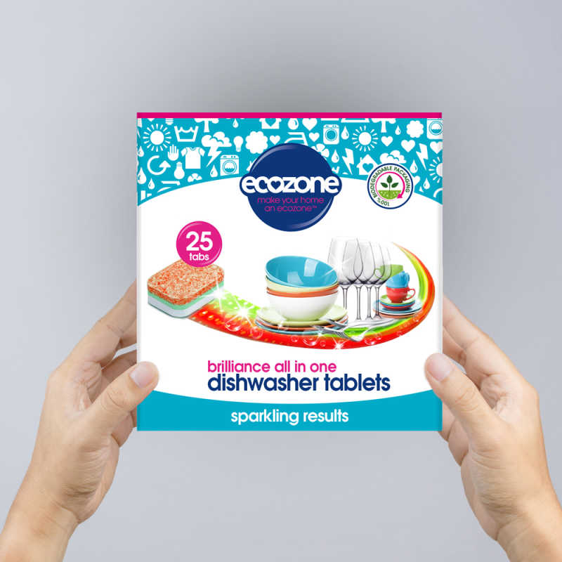 Person holding ecozone dishwasher tablets