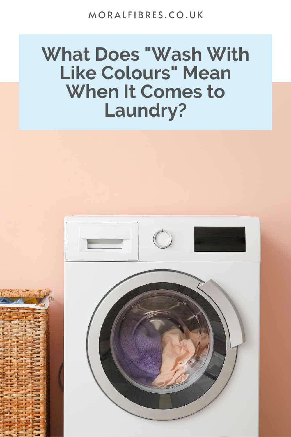 A washing machine and laundry basket with a blue text box that reads what does "wash with like colours" mean when it comes to laundry?