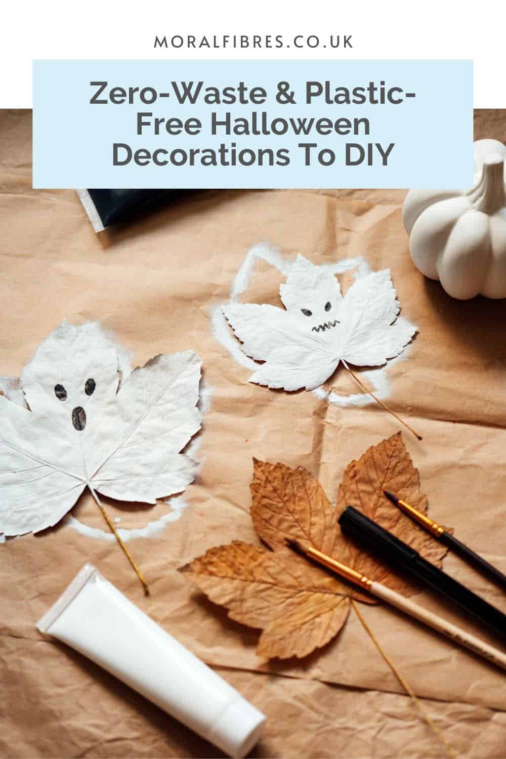 Autumn leaves painted white with spooky faces drawn on, with a a blue text box that reads zero-waste and plastic-free Halloween decorations to DIY